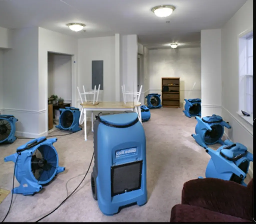 Air movers and dehumidifier setup for Water Extraction & Removal in Magna